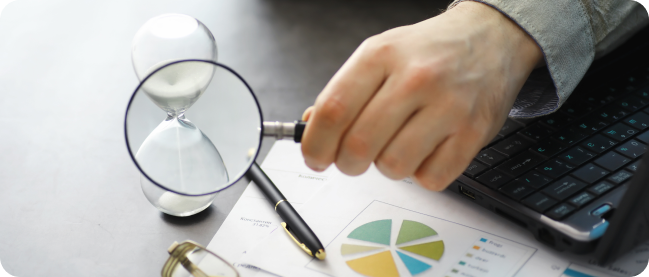 The image shows a successful employee managing portfolio analysis