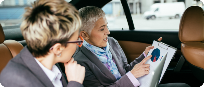 in the image an employee evaluates the driver's behavior analysis report