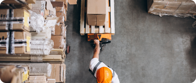 An employee releases products according to demand in the warehouse