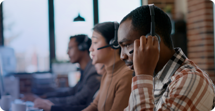 a group of call center employees contacting customers
